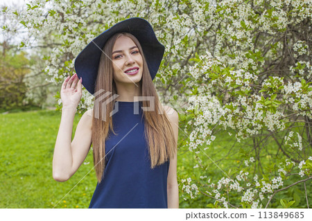 Joyful spring woman fashion beauty portrait. Young model with make-up and long hair Joyful spring woman fashion beauty portrait. Young model with make-up and long hair 113849685