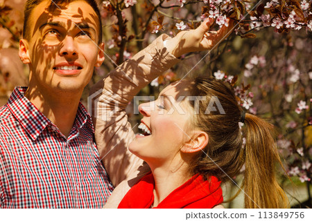 Happy couple having romantic date in park Happy couple having romantic date in park 113849756