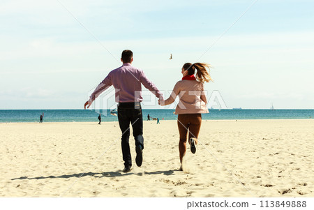 romantic couple in love having fun on beach 113849888