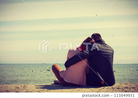 Happy couple having date on beach 113849931