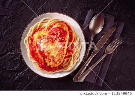 Chicken Parmesan, Italian pasta dish. Breaded chicken breast with cheese 113849946