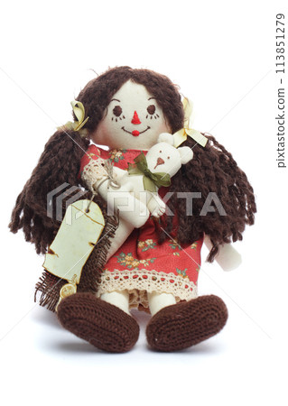 Traditional doll toy on white background Traditional doll toy on white background 113851279