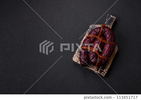 Delicious black blood sausage or black pudding with spices and herbs Delicious black blood sausage or black pudding with spices and herbs 113851717