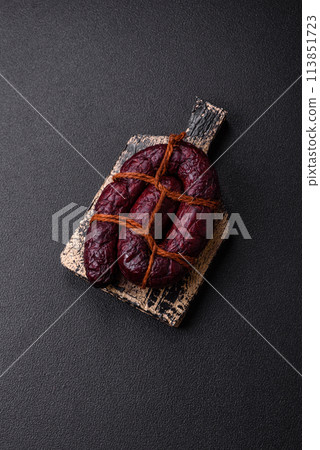 Delicious black blood sausage or black pudding with spices and herbs 113851723