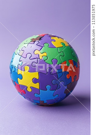 Puzzle globe on a lavender background. Still life photography with copy space. Autistic Pride Day. AI generative 113851975