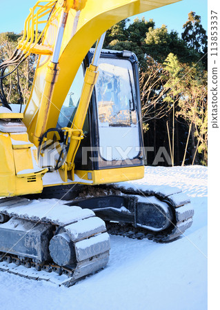 Excavator in the snow Excavator in the snow 113853337