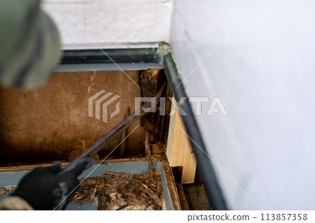 Repairing a damaged balcony 113857358