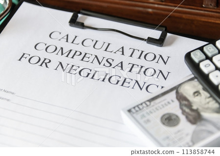 Legal document titled 'Calculation Compensation for Negligence' with a gavel and calculator, symbolizing judicial proceedings. Legal document titled 'Calculation Compensation for Negligence' with a gavel and calculator, symbolizing judicial proceedings. 113858744