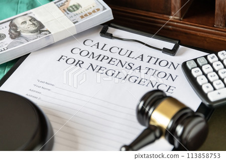Legal document titled 'Calculation Compensation for Negligence' with a gavel and calculator, symbolizing judicial proceedings. 113858753