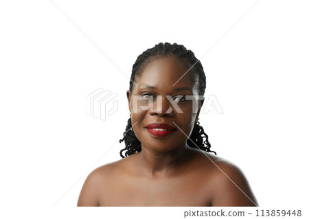 Portrait of adult African beautiful woman with red lips, clear, spotless skin smiling isolated on white studio background Portrait of adult African beautiful woman with red lips, clear, spotless skin smiling isolated on white studio background 113859448