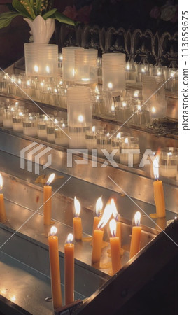 Candles are lit in the Catholic Church. Candles are lit in the Catholic Church. 113859675