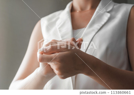 Women washing hands with antibacterial sanitizer gel. Hygiene concept. Prevent the spread of germs and bacteria and avoid infections corona virus Women washing hands with antibacterial sanitizer gel. Hygiene concept. Prevent the spread of germs and bacteria and avoid infections corona virus 113860661
