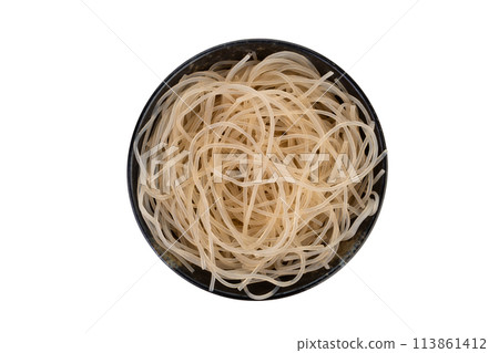 Fresh korean glass noodles in black bowl isolated on white background with clipping path.Korean and Japanese glass noodles are typically made from sweet potato starch.Top view Fresh korean glass noodles in black bowl isolated on white background with clipping path.Korean and Japanese glass noodles are typically made from sweet potato starch.Top view 113861412