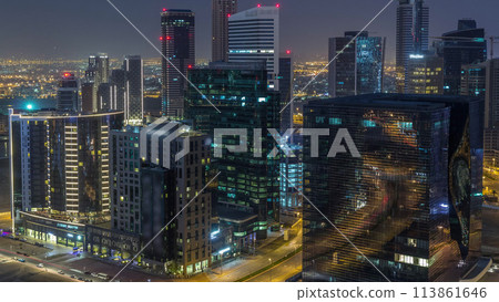 Panorama of Business bay Dubai night to day aerial timelapse. 113861646