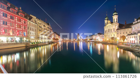 Fabulous historic city center of Lucerne with famous buildings and promenade during night. 113861726