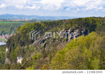 Beautiful summer view of Elbe river from Bastei view pont. Colorful morning scene of Saxon Switzerland national park, Germany, Europe. Splendid landscape of Sandstone Mountains, Saxony. 113861943