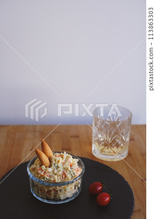 Potato salad made with tuna, eggs and plenty of vegetables Potato salad made with tuna, eggs and plenty of vegetables 113863303