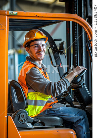 A Caucasian male employee is driving a forklift in a factory. 113863407