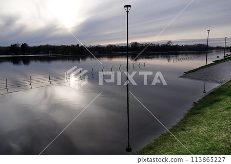 Kyiv, Ukraine April 17, 2023: Flooding - flooding of the embankment in a new area in the city of Kyiv Kyiv, Ukraine April 17, 2023: Flooding - flooding of the embankment in a new area in the city of Kyiv 113865227