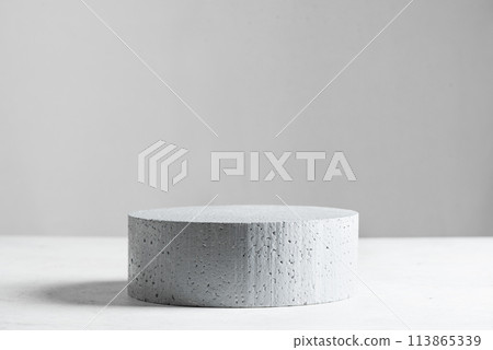 Empty stone podium on gray scene Empty stone podium on gray scene 113865339