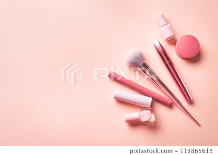 Set of decorative cosmetics on pink background 113865613