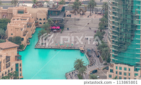 Dubai downtown with fountains area near mall and souk timelapse. 113865801