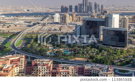 View of new modern buildings and high traffic in luxury Dubai city, United Arab Emirates Timelapse Aerial View of new modern buildings and high traffic in luxury Dubai city, United Arab Emirates Timelapse Aerial 113865888