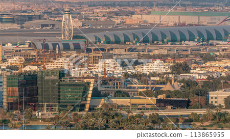 View of modern buildings in luxury Dubai city at sunset aerial timelapse View of modern buildings in luxury Dubai city at sunset aerial timelapse 113865955