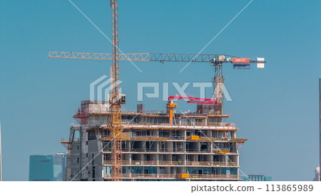Construction of new modern skyscrapers in luxury Dubai city,United Arab Emirates Construction of new modern skyscrapers in luxury Dubai city,United Arab Emirates 113865989