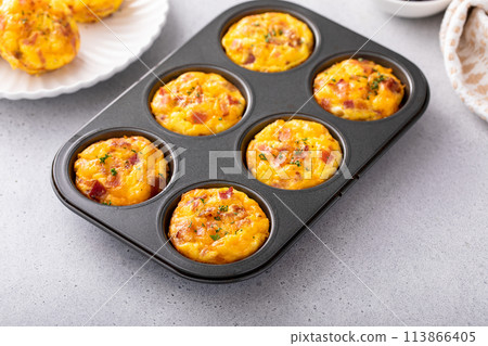 Egg muffins with bacon and cheddar, egg bites for breakfast Egg muffins with bacon and cheddar, egg bites for breakfast 113866405