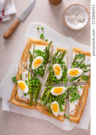 Asparagus and egg tart with puff pastry and cream cheese Asparagus and egg tart with puff pastry and cream cheese 113866451
