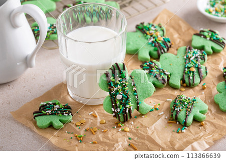 Shamrock cookies for Saint Patricks day with chocolate glaze and sprinkles Shamrock cookies for Saint Patricks day with chocolate glaze and sprinkles 113866639