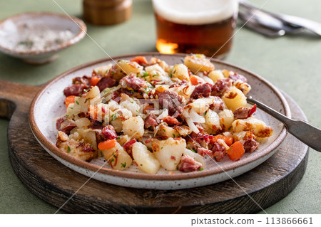 Corned beef hash with potatoes and carrots 113866661