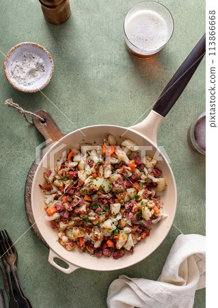 Corned beef hash with potatoes and carrots 113866668