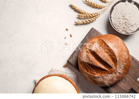 Fresh Sourdough Bread and ingredients. Bread making. Fresh Sourdough Bread and ingredients. Bread making. 113866742