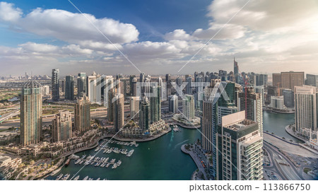 Dubai Marina skyscrapers and jumeirah lake towers view from the top aerial timelapse in the United Arab Emirates. 113866750