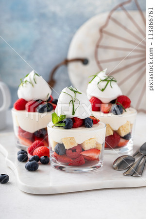 Pound cake and berries layered dessert in a cup, dessert in a glass Pound cake and berries layered dessert in a cup, dessert in a glass 113866761