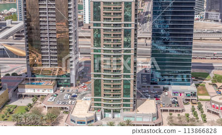 Residential apartments and offices in Jumeirah lake towers district timelapse in Dubai Residential apartments and offices in Jumeirah lake towers district timelapse in Dubai 113866828