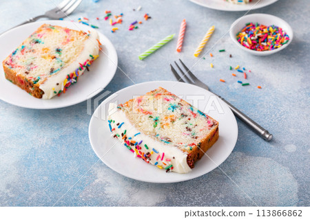Funfetti birthday cake slices on the table 113866862