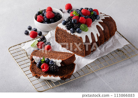 Lemon bundt cake on a cake stand with powdered sugar glaze Lemon bundt cake on a cake stand with powdered sugar glaze 113866883