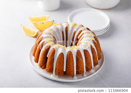 Lemon bundt cake with sugar powder vanilla icing 113866904