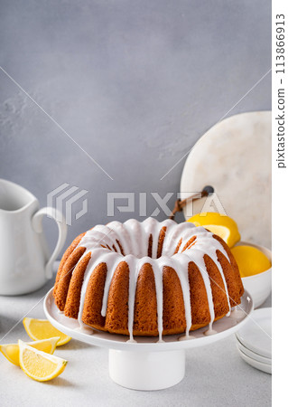 Lemon bundt cake with sugar powder vanilla icing Lemon bundt cake with sugar powder vanilla icing 113866913