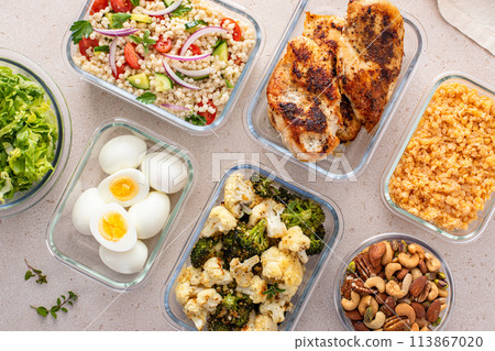 Healthy meal prep with cooked chicken breast, boiled eggs, roasted vegetables, cooked lentils, couscous salad and nuts Healthy meal prep with cooked chicken breast, boiled eggs, roasted vegetables, cooked lentils, couscous salad and nuts 113867020