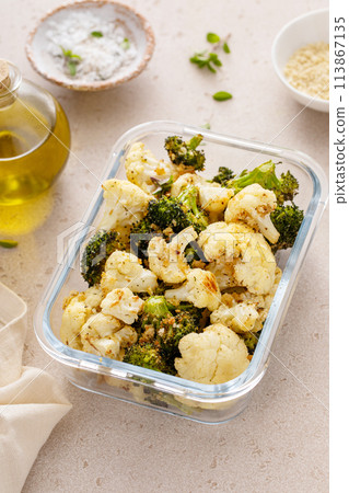 Roasted cauliflower and broccoli in a meal prep container, healthy vegetable side dish Roasted cauliflower and broccoli in a meal prep container, healthy vegetable side dish 113867135