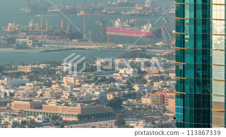 Aerial view from Downtown of Dubai to port timelapse 113867339