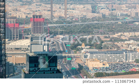 Aerial view to financial and zabeel district timelapse with traffic and under construction building with cranes from downtown 113867343