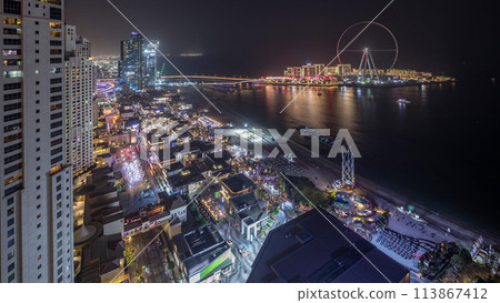 Waterfront overview Jumeirah Beach Residence JBR skyline aerial night timelapse 113867412