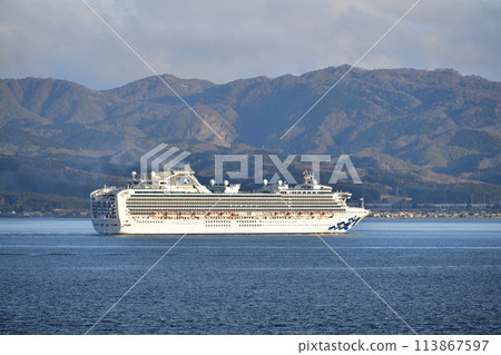 Photographing the cruise ship Diamond Princess sailing through Hakodate Bay in Hakodate, Hokkaido in spring 113867597