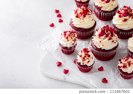 Red velvet cupcakes with cream cheese frosting for Valentines day Red velvet cupcakes with cream cheese frosting for Valentines day 113867602