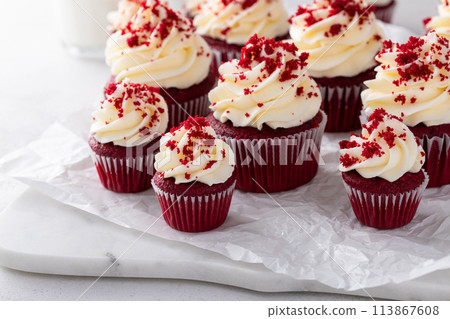 Red velvet cupcakes with cream cheese frosting on a marble board 113867608